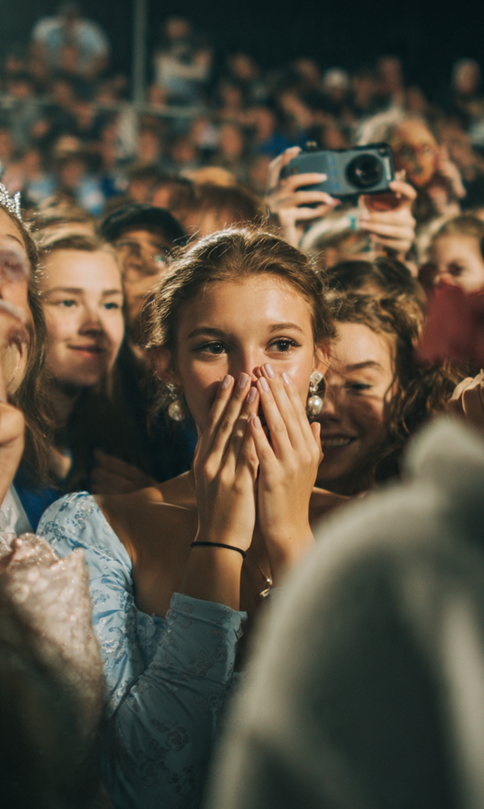 Student reacting in a crowd